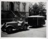 image of Mr. Hancock and man in automobile pulling trailer