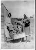 image of Two women with wheelbarrow